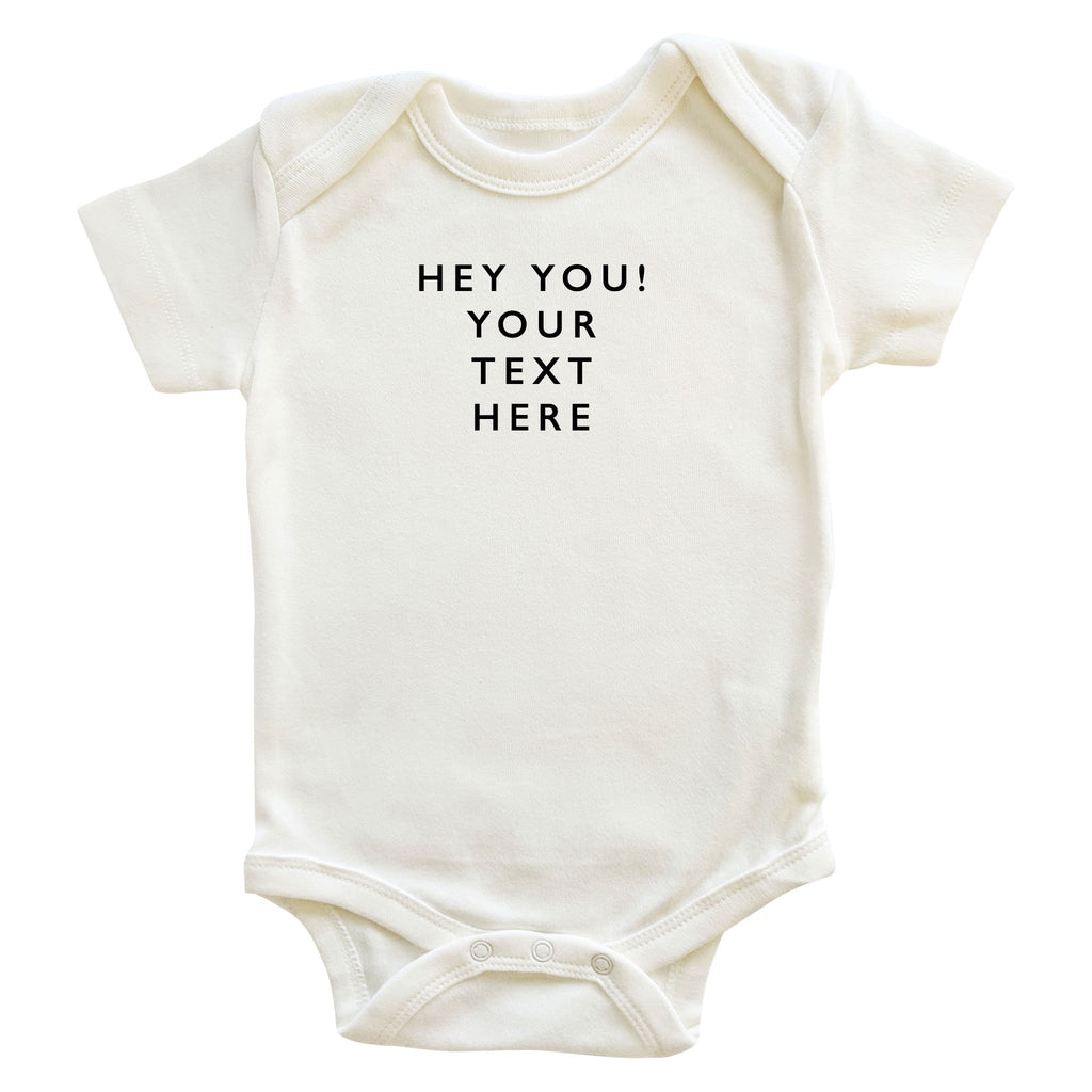 Custom baby onesie with black text