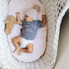 Baby wearing 'The Snuggle is Real' tee in crib